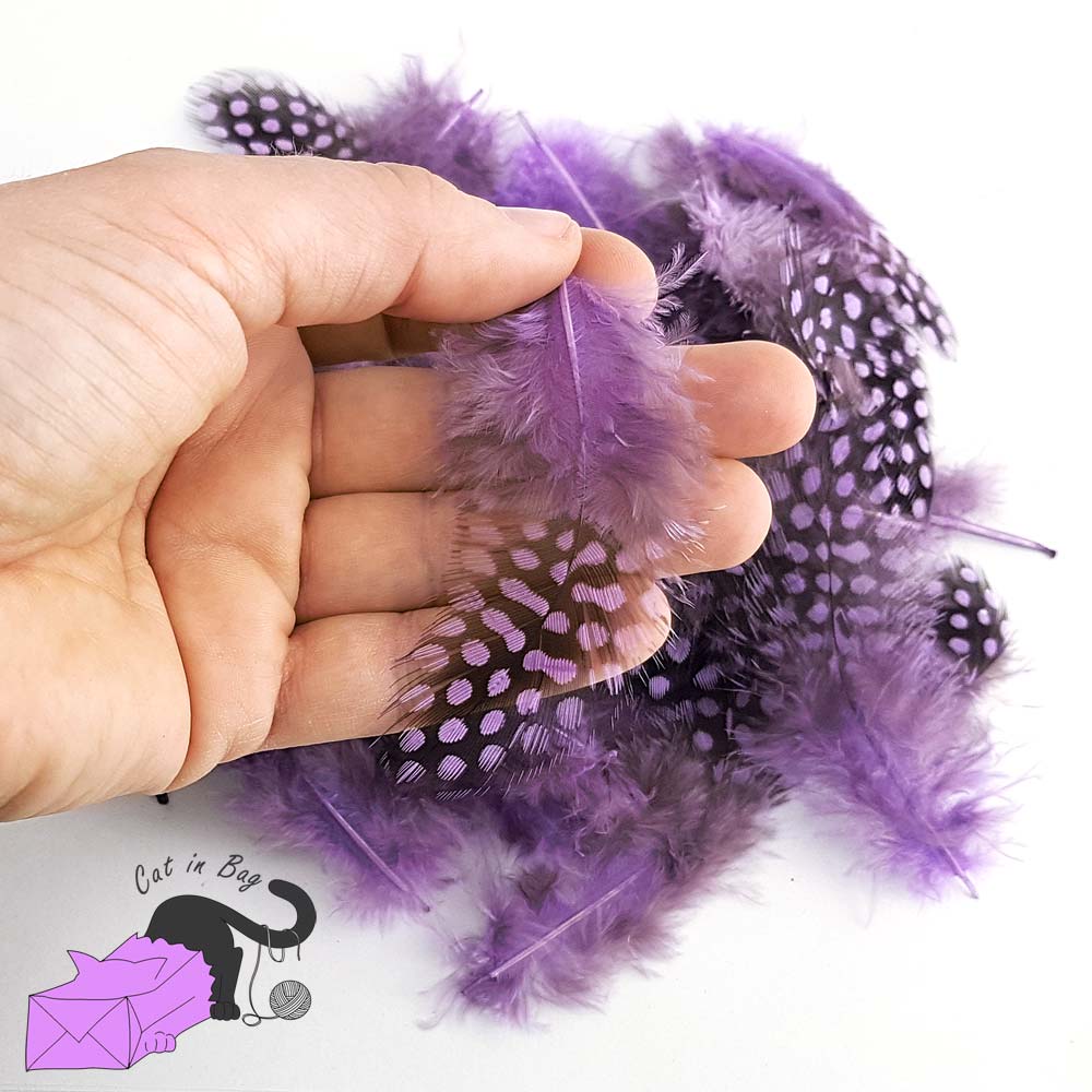 50 natural feathers violet color