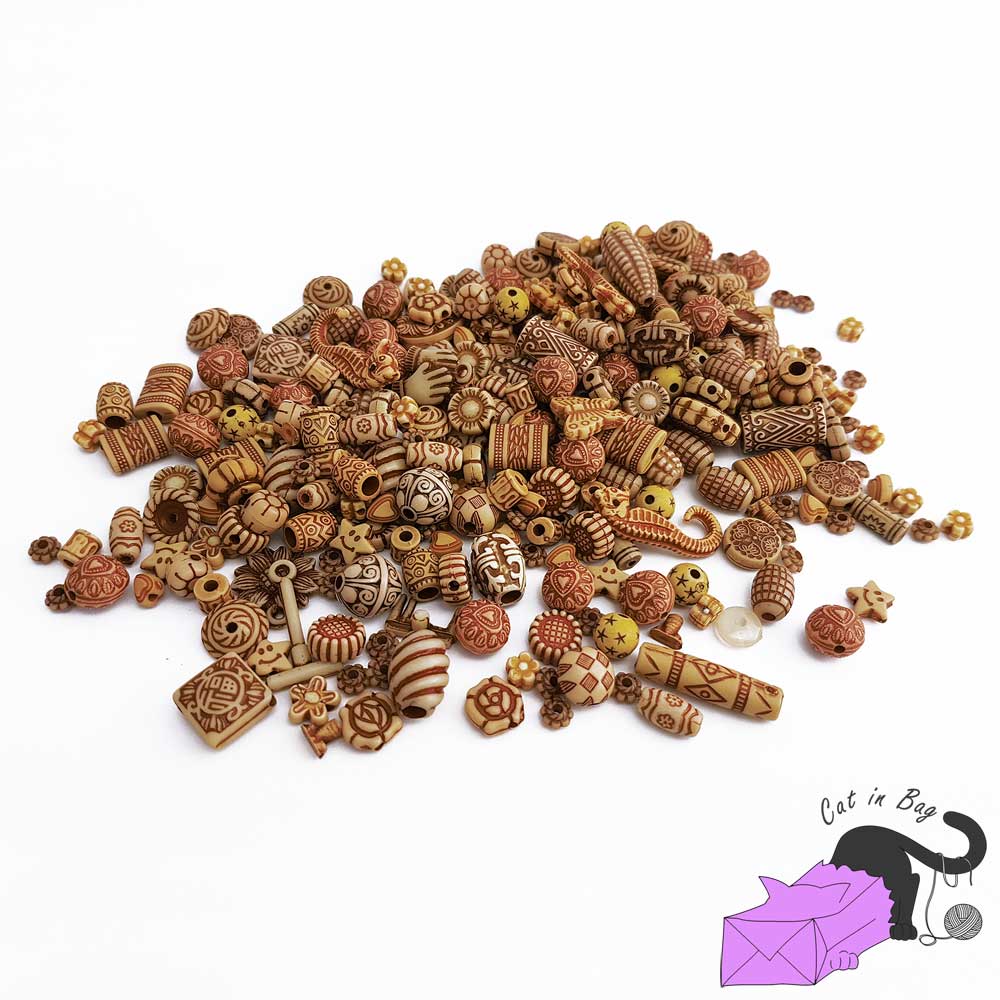 Mix of antique ethnic effect acrylic beads - brown colour
