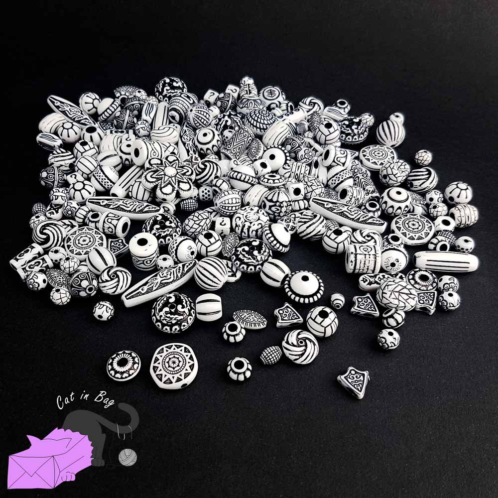 Mix of antique ethnic effect acrylic beads white colour
