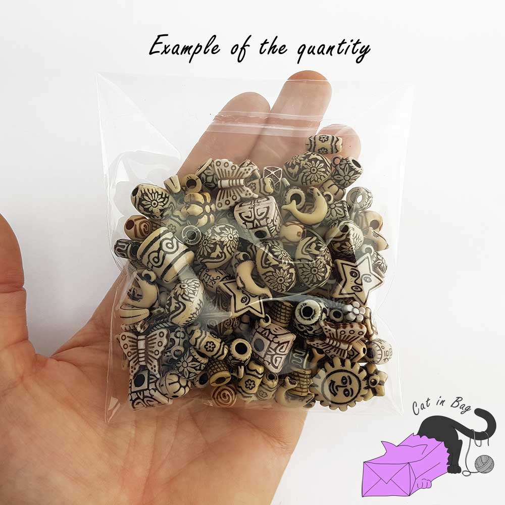Mix of antique ethnic effect acrylic beads - light sand colour