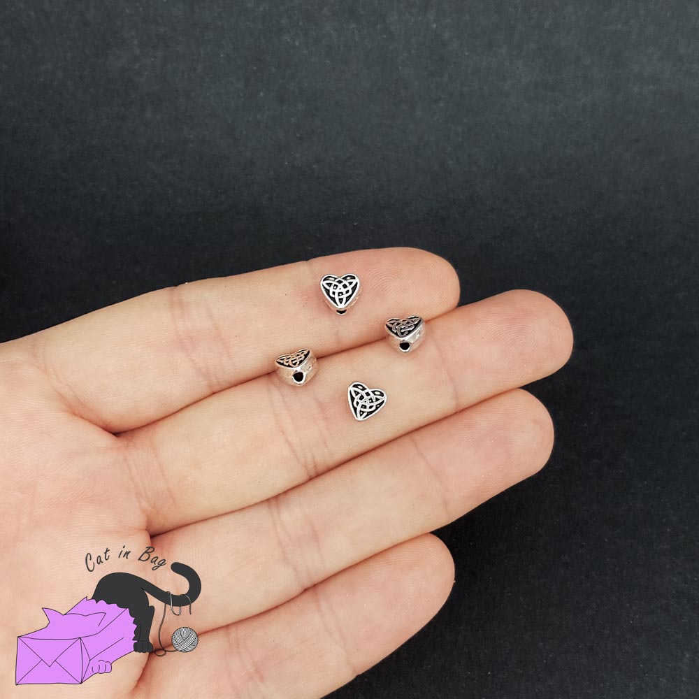 10 heart spacer beads with celtic knot