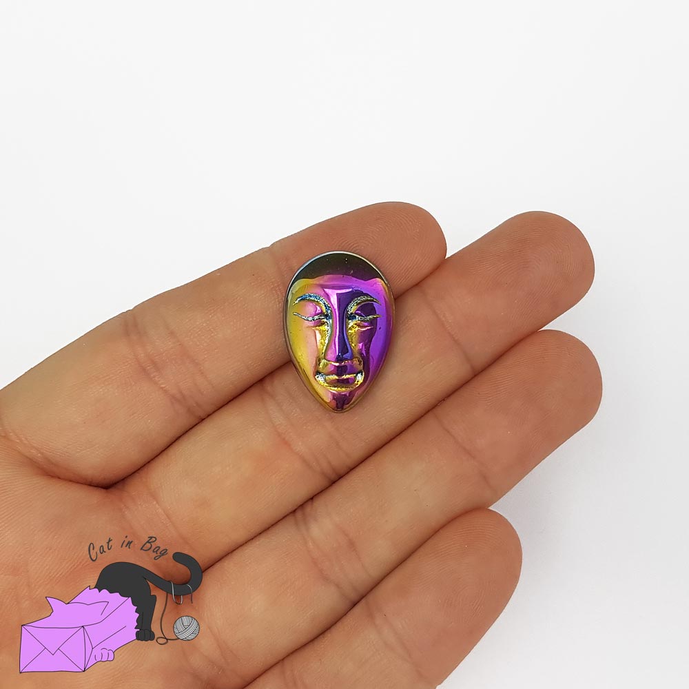 1 Goddess face cabochon in titanium purple aura quartz