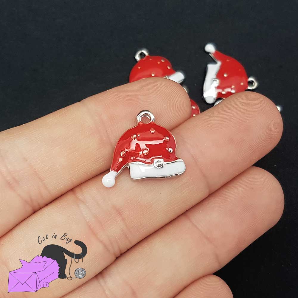 2 enamel charms with Santa's hat