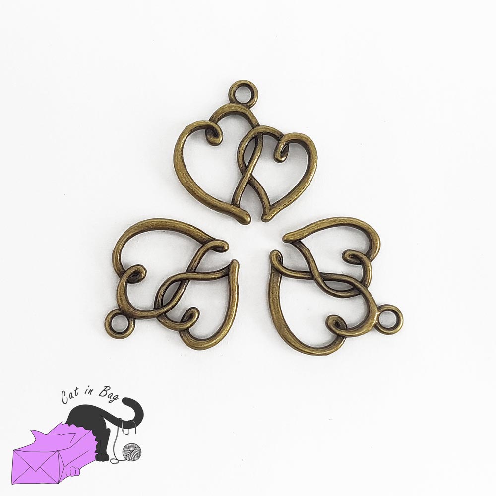 10 charms with two hearts, antique bronze tone