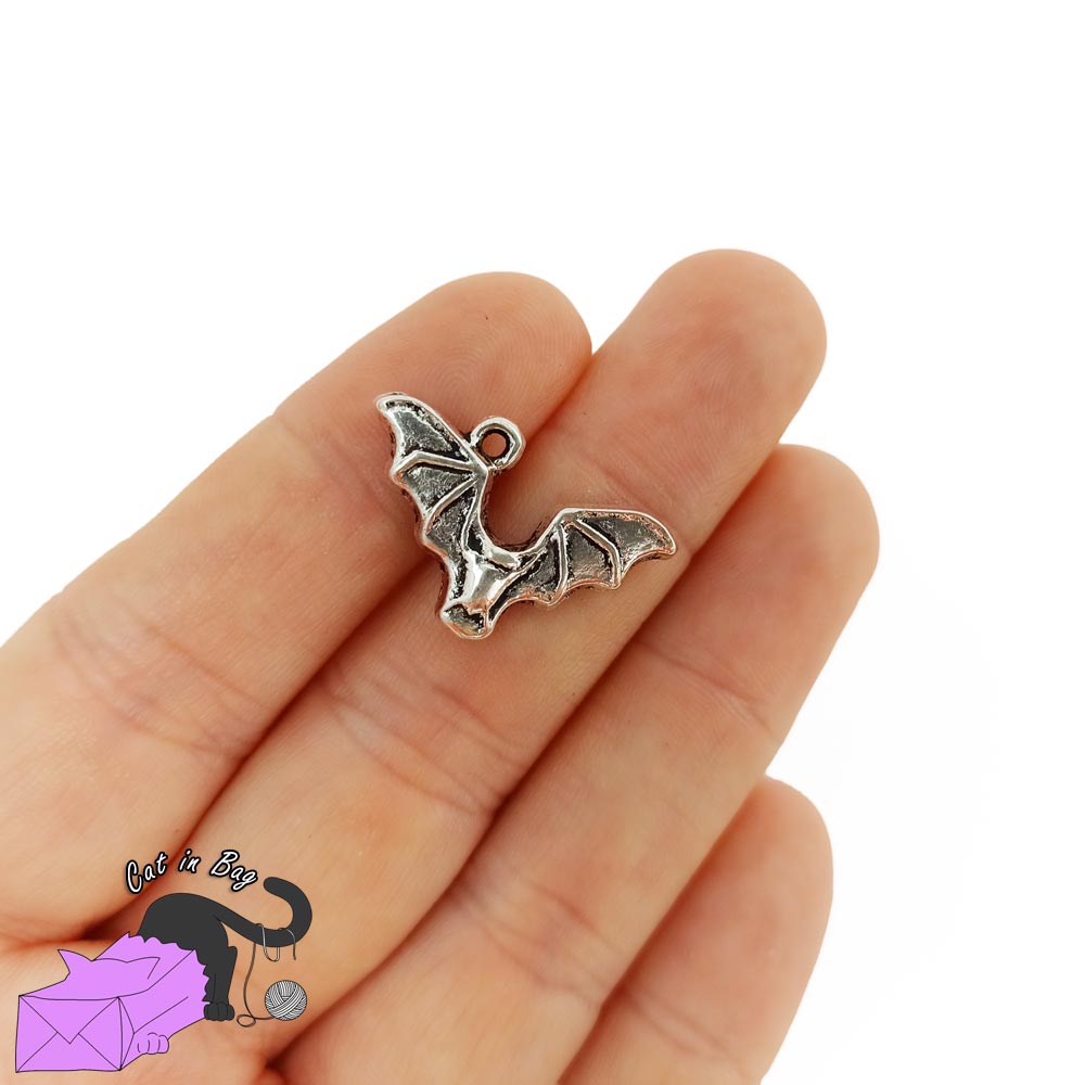 5 charms with bat