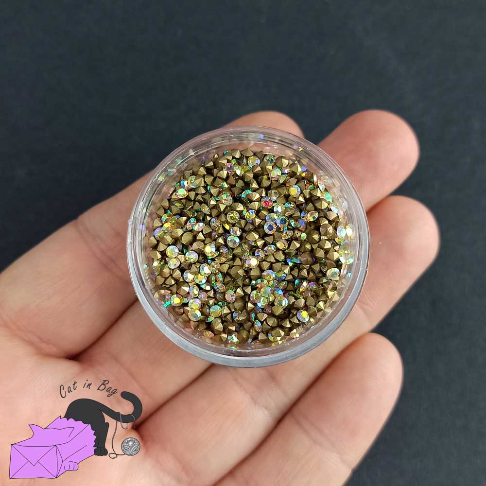 Micro crystals grade AAA, AB color white, diamond shape, pointed back.