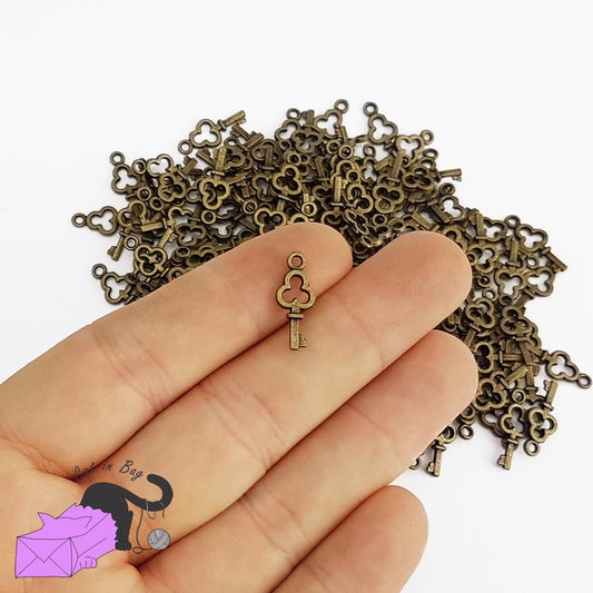 20 charms with little key antique bronze tone
