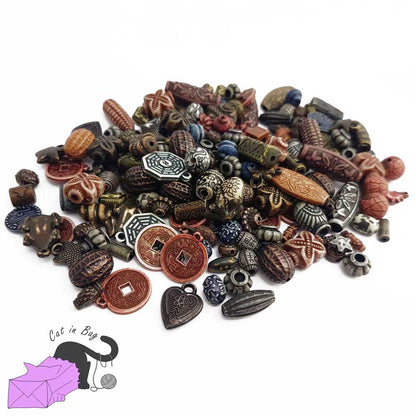 Mix of 50 gr antique ethnic effect acrylic beads in the colours of the Earth