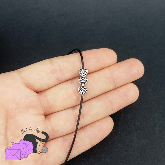 10 heart spacer beads with celtic knot