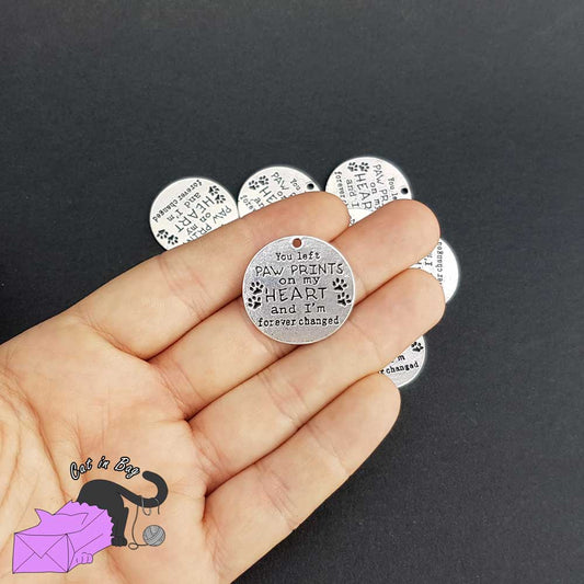 1 charm with words "you left paw print on my heart and I'm forever changed"