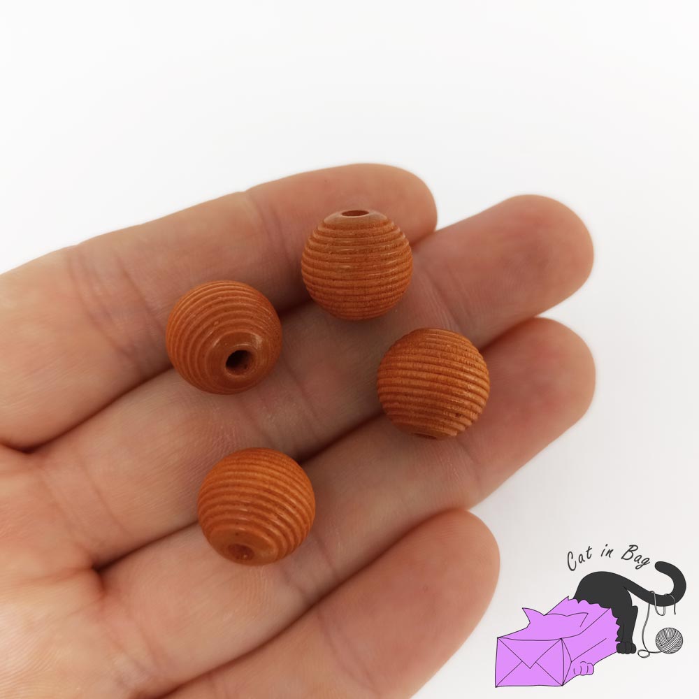 10 perle rigate in legno color nocciola
