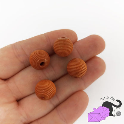 10 perle rigate in legno color nocciola